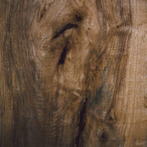 brown wooden board with hole