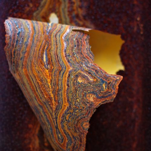 a piece of art that looks like a piece of wood
